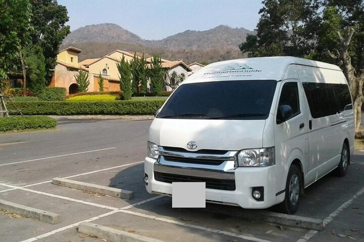a white van parked in a parking lot