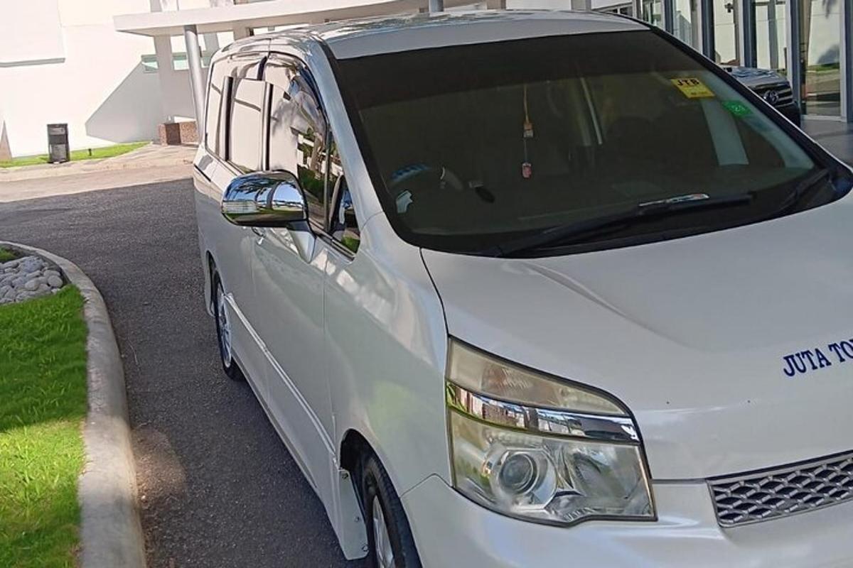 a white van parked on the side of a street