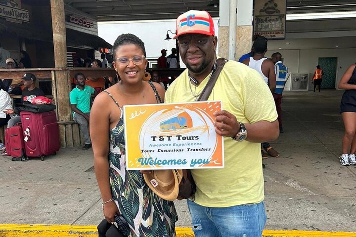 a man and a woman holding up a sign