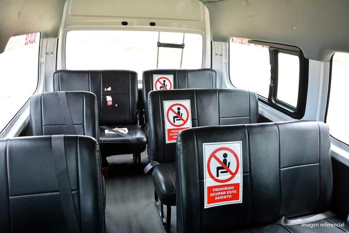 a row of empty seats on a bus