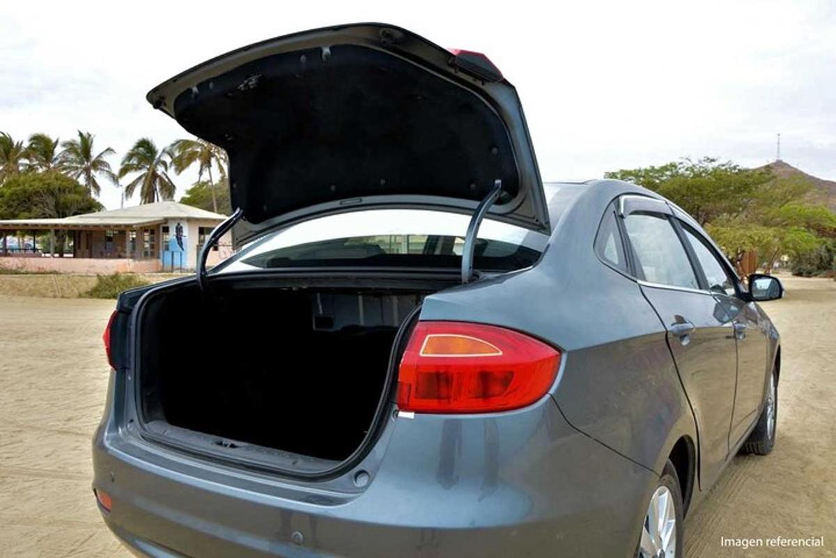 a car with its door open with its trunk