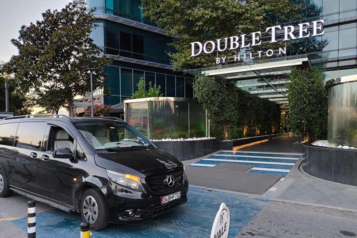 a black van parked in front of a building