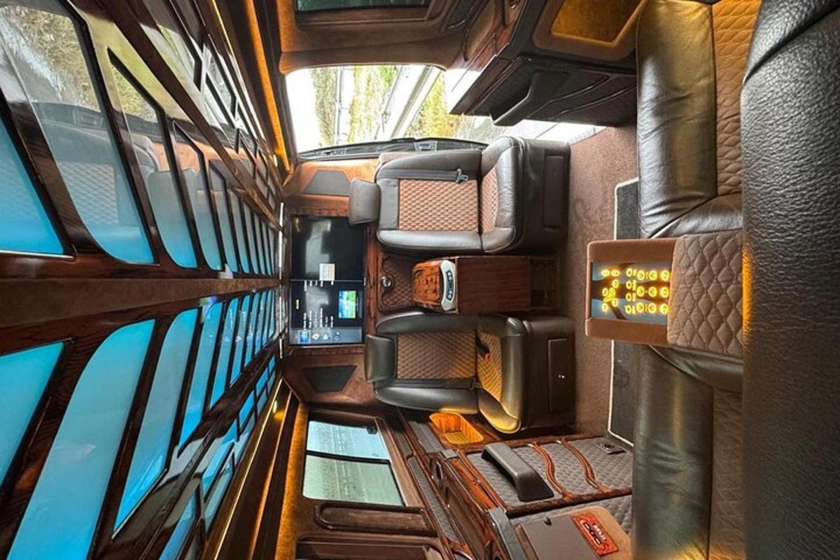a view of the inside of a bus with windows
