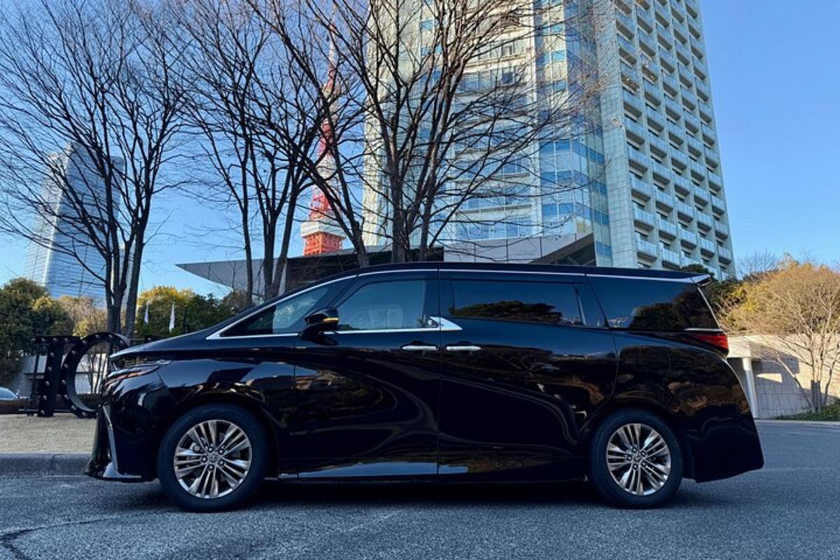 a black car parked in a parking lot