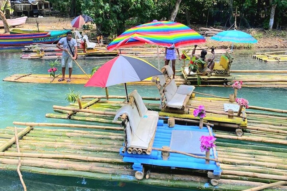 a raft with chairs and umbrellas on the water
