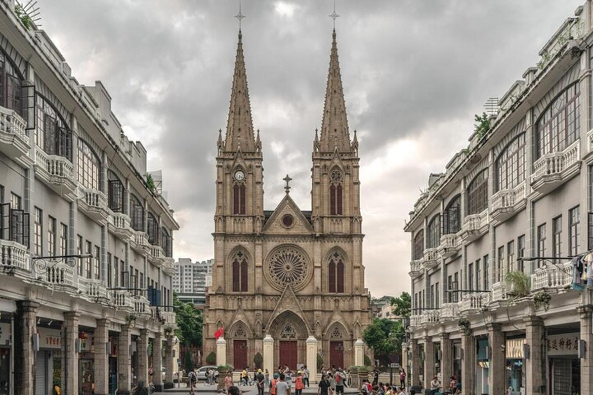 an old cathedral with two towers in a city