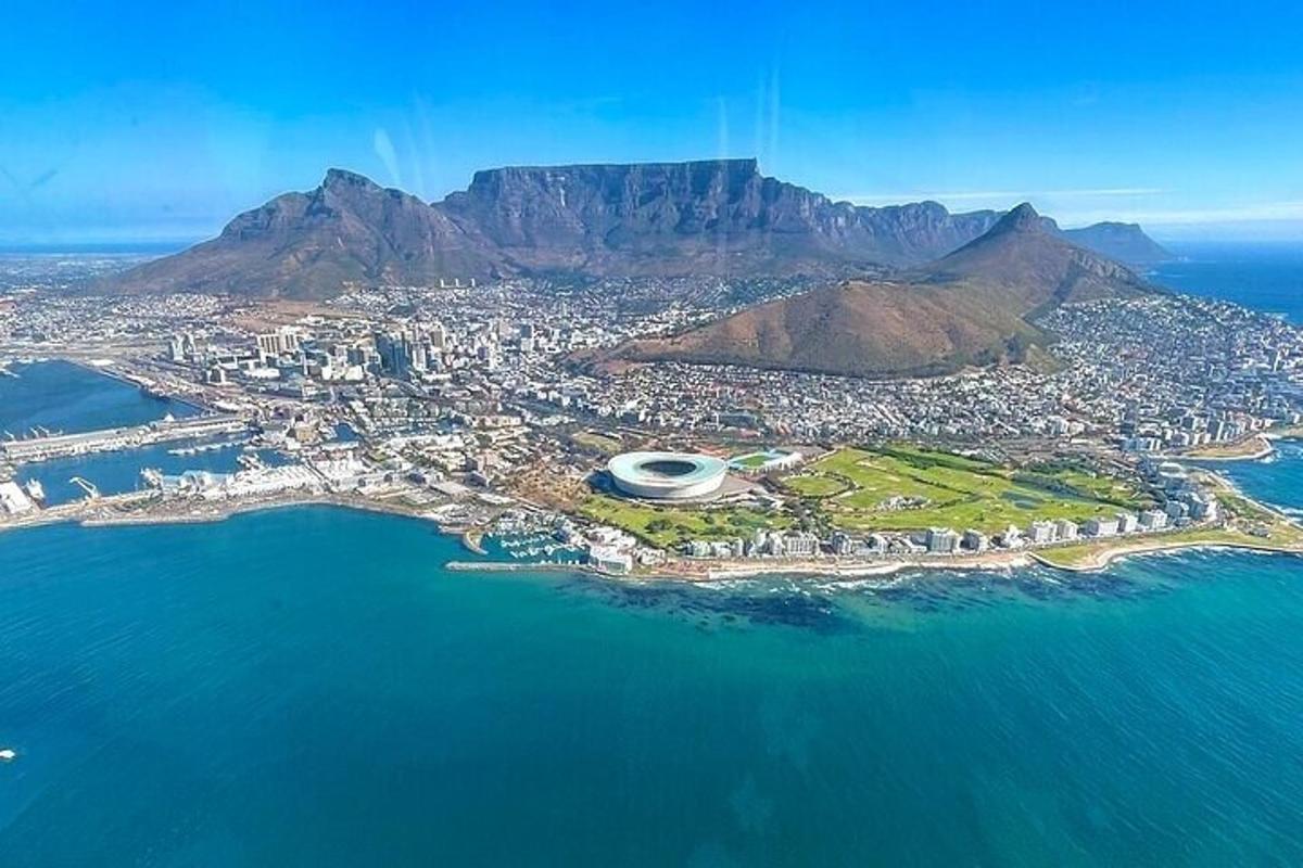 an aerial view of cape town with a mountain