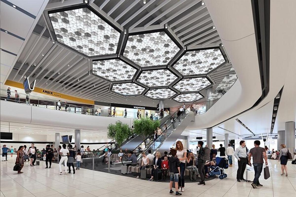 공항 터미널을 걷고 있는 사람들의 그룹