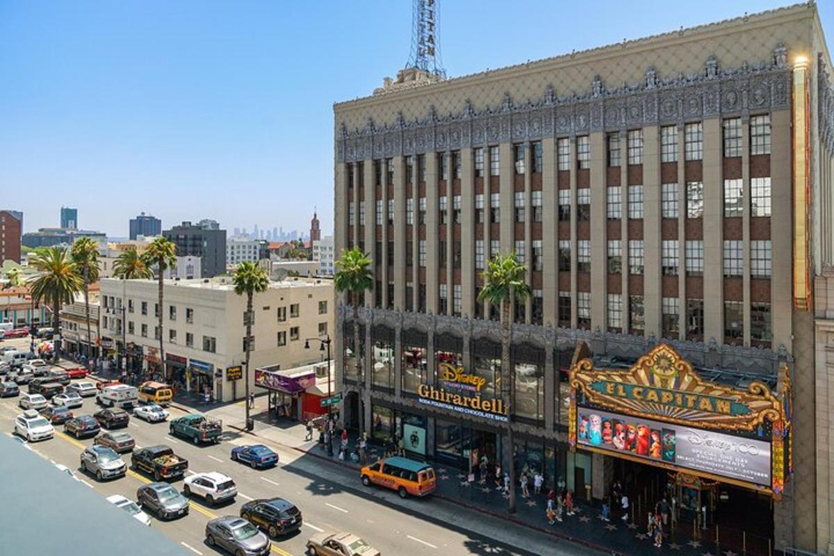 an aerial view of a busy city street with cars