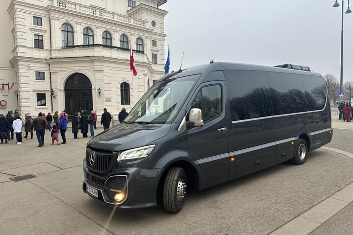 a black van parked in front of a building