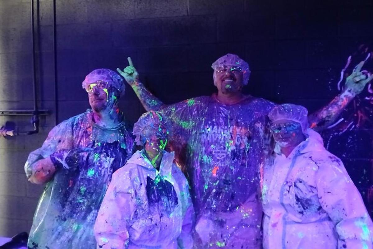 a group of people dressed up in paint