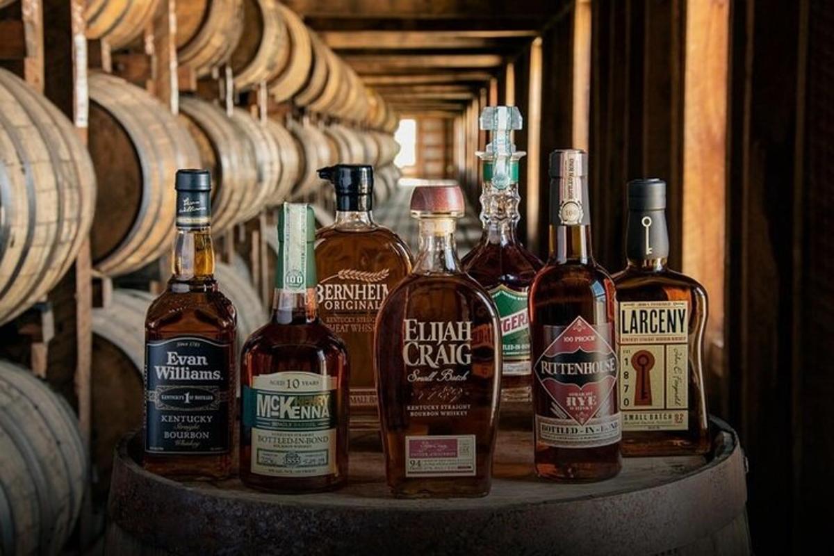 a group of bottles of whiskey sitting on a table