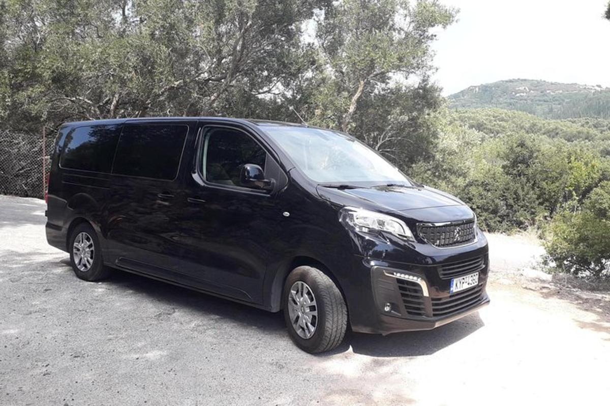 a black van parked on the side of a road