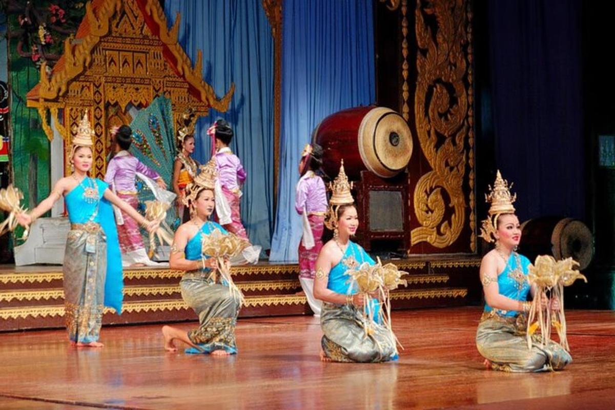 a group of women performing a dance on a stage