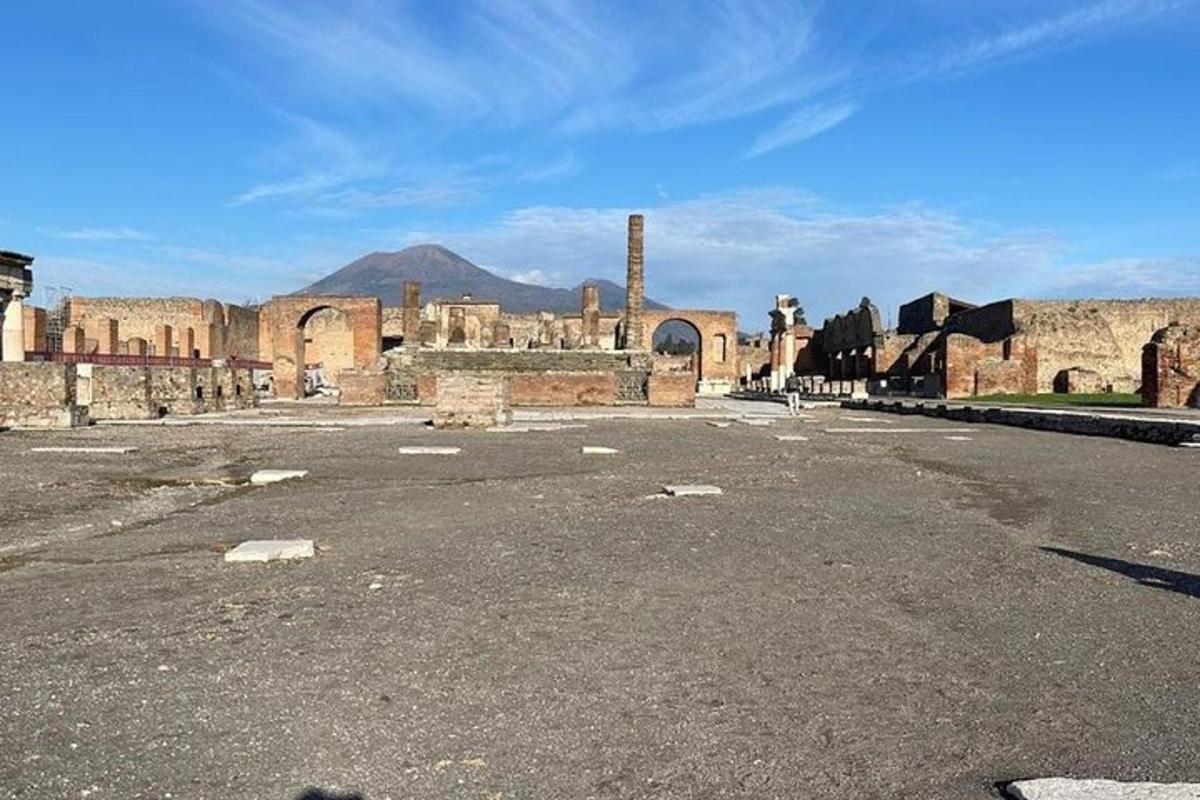 an empty parking lot in front of an old building