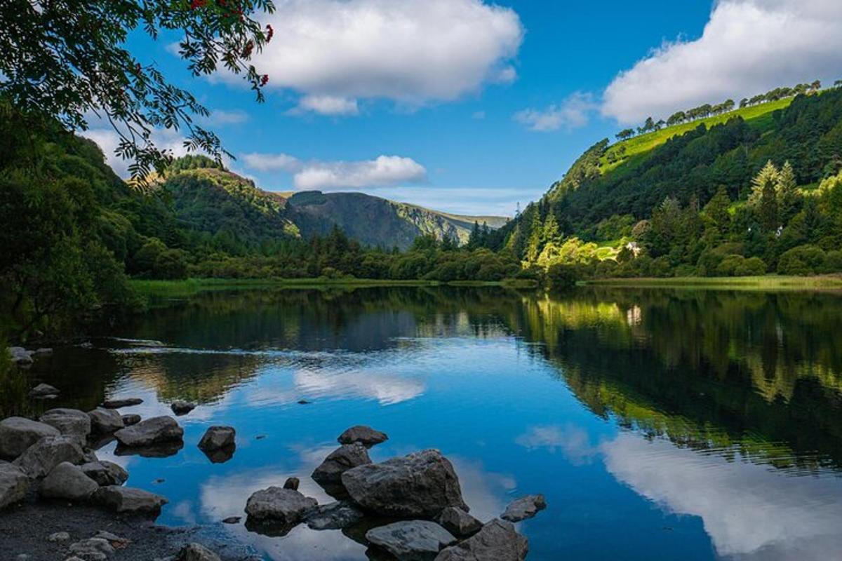 a view of a river with mountains in the background