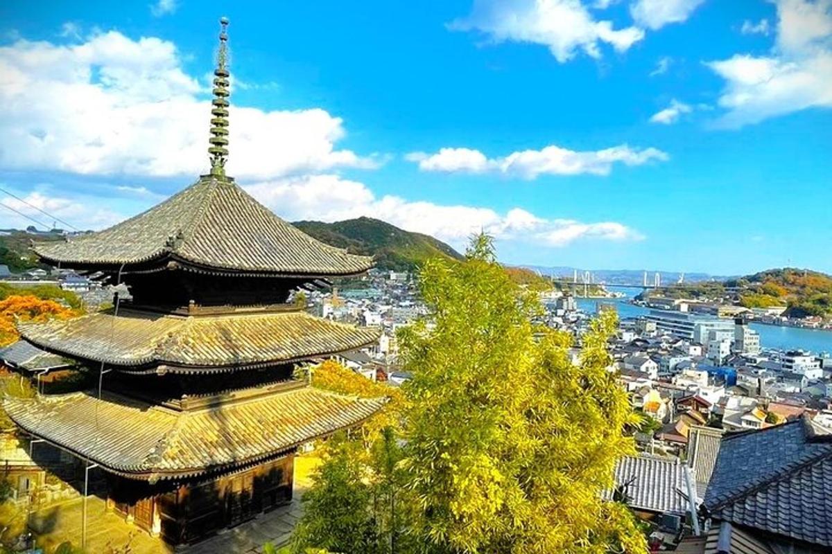 an asian building with a tower on top of a city