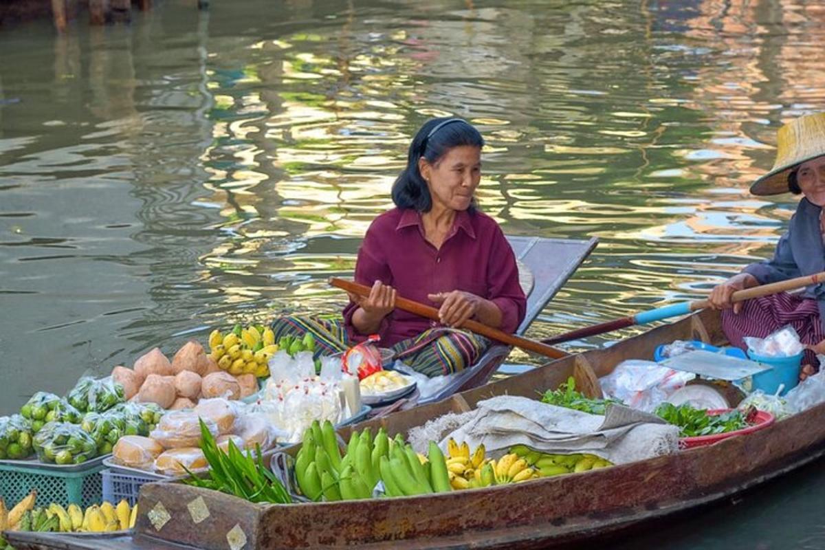 a woman in a boat filled with fruits and vegetables