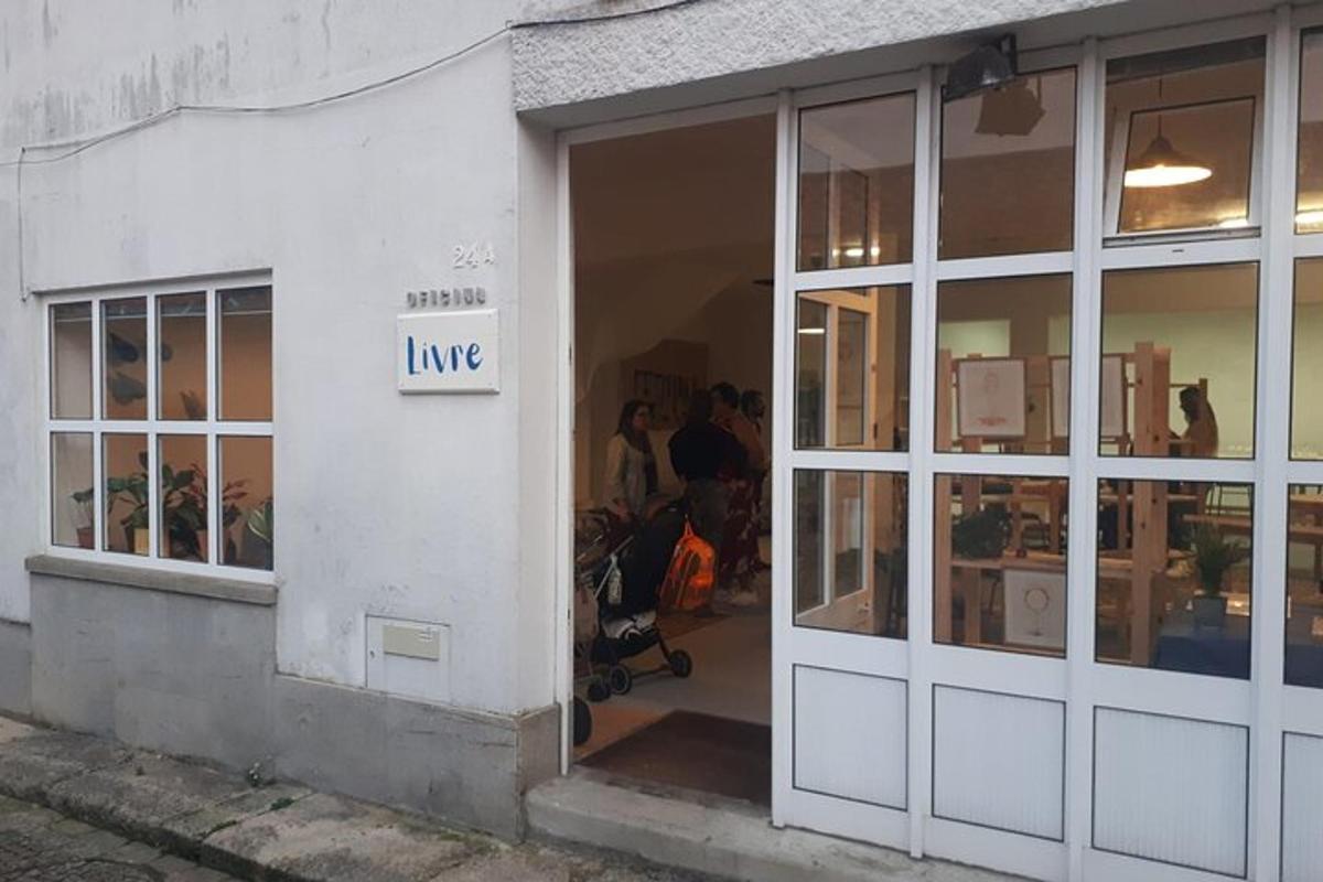 an open door of a store with people inside