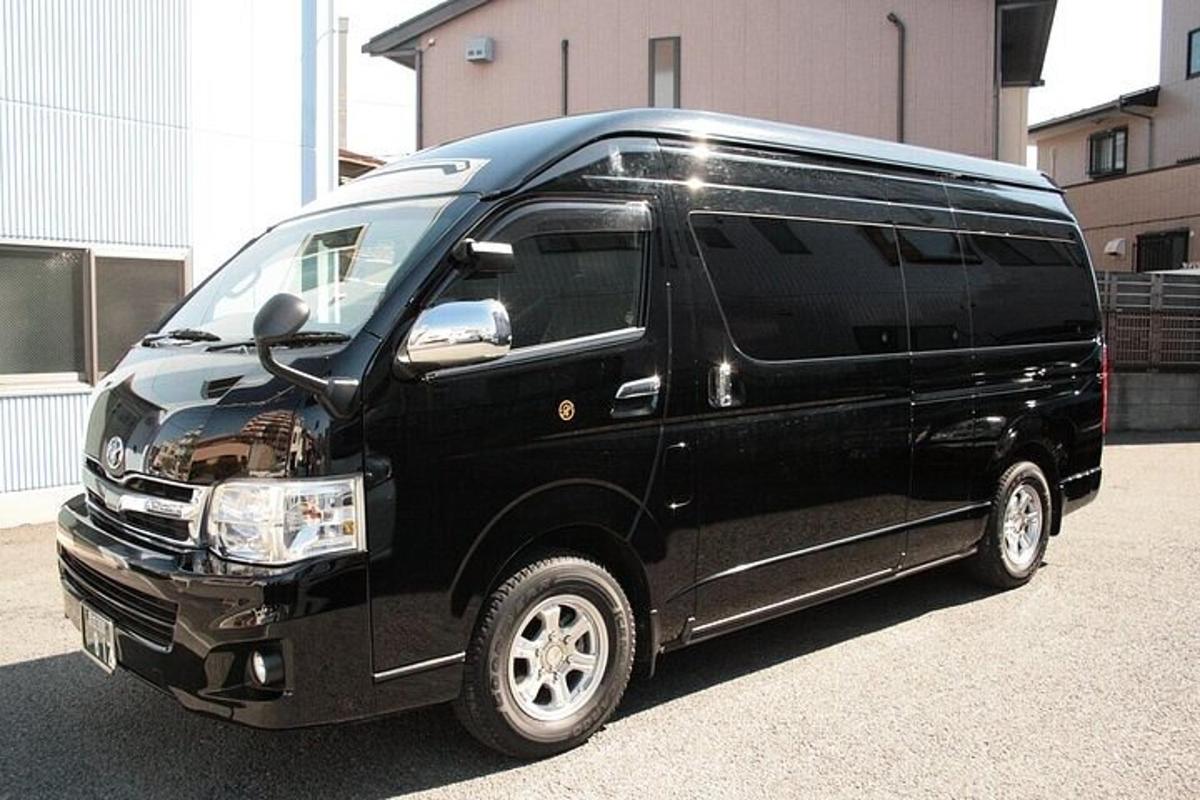 a black van parked in a parking lot