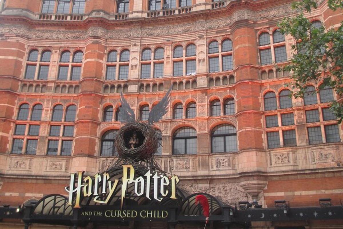 a large brick building with a sign in front of it