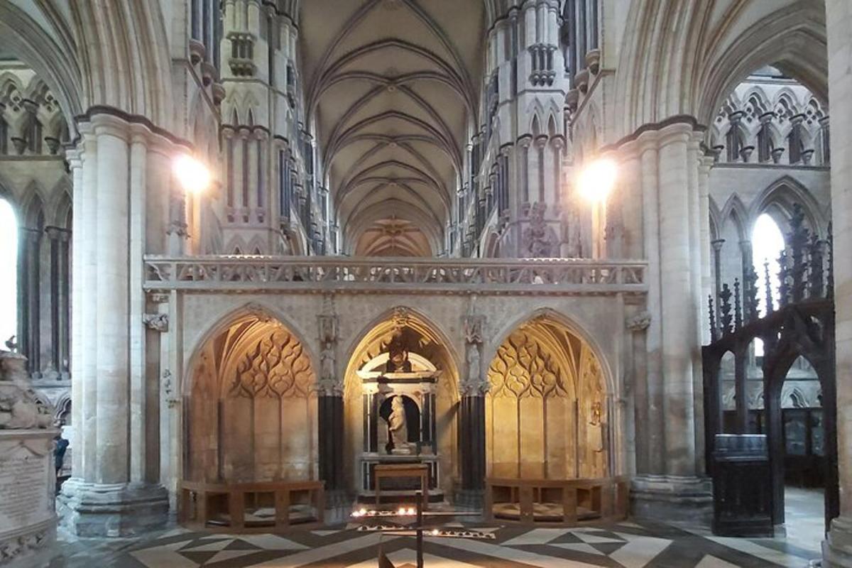 a cathedral with a statue in the middle of it