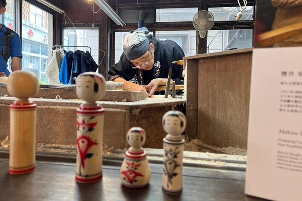 a man in a kitchen preparing food in a kitchen