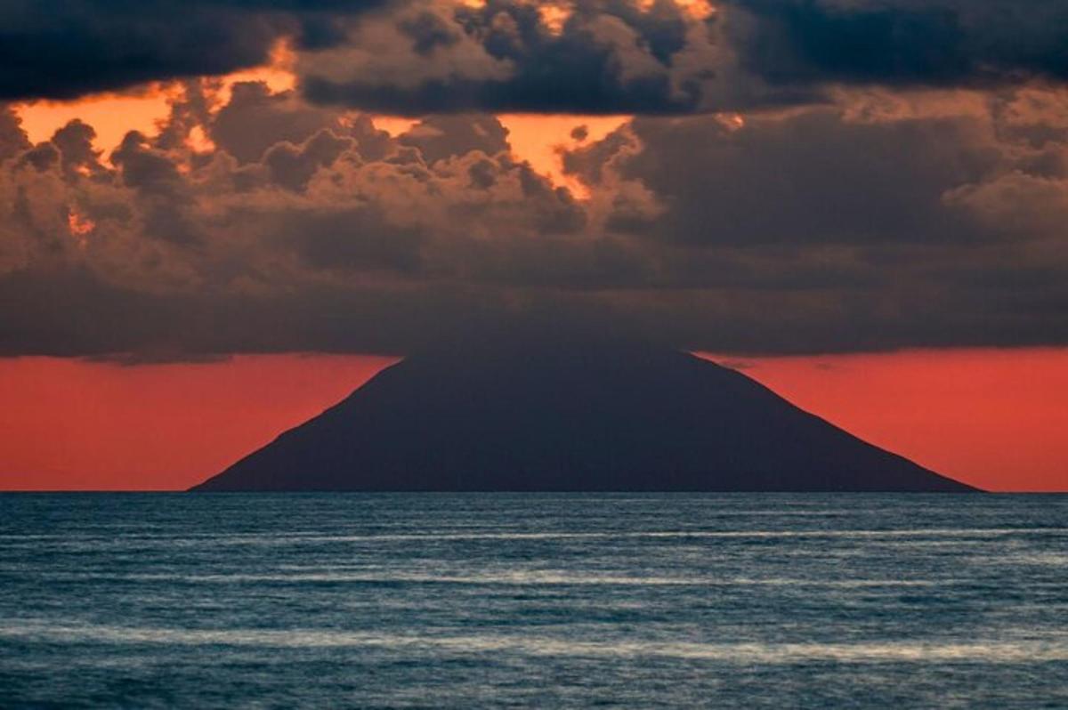 a mountain in the middle of the ocean