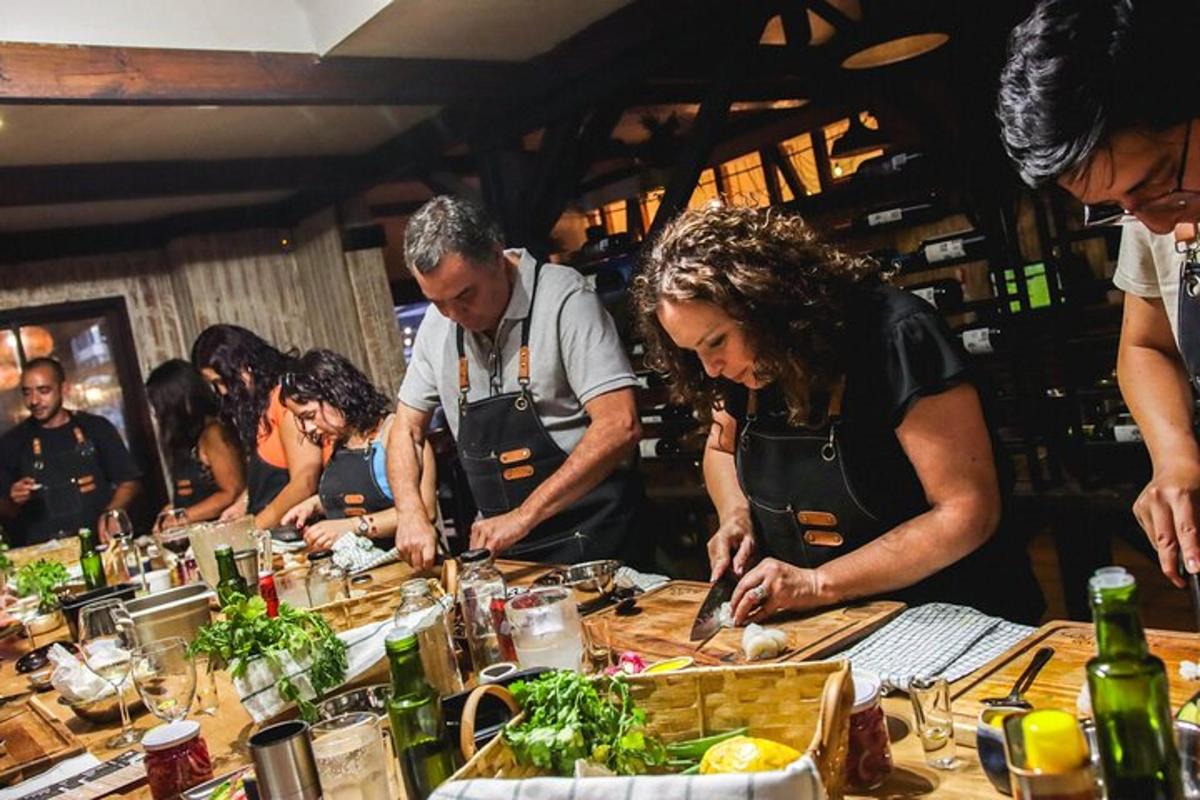 a group of people in a kitchen preparing food