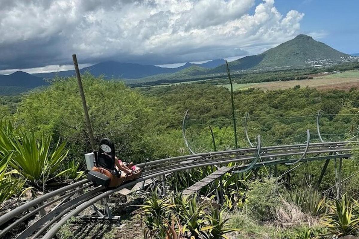 a person is sitting on a roller coaster
