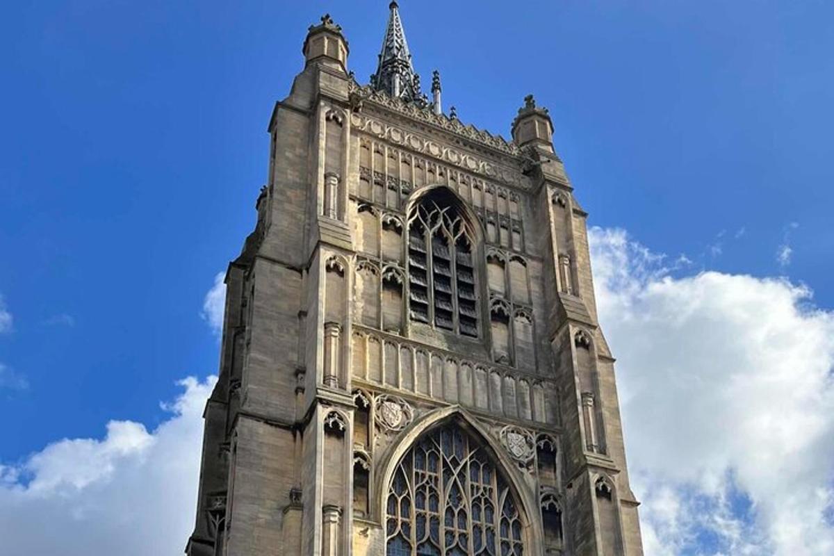 a tall building with a sky in the background