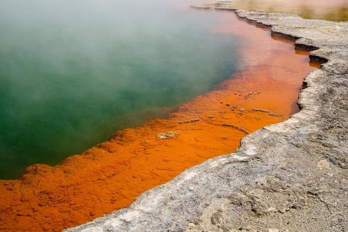 an image of a body of water with steam and fire