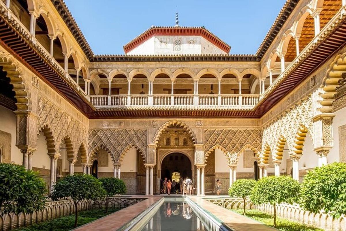 a courtyard of a building with a pool of water