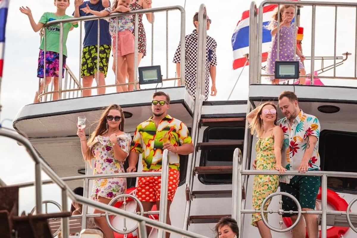 a group of people standing on a boat