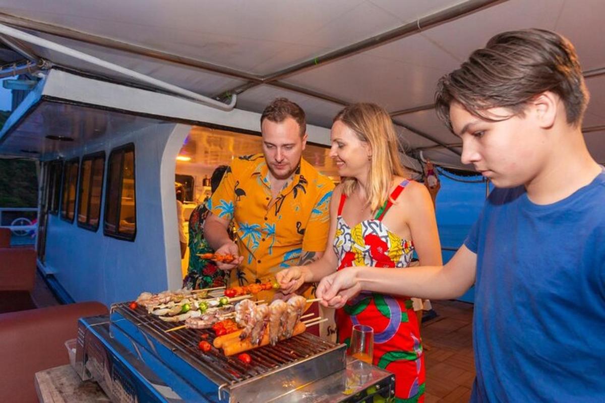 a man and a woman cooking food on a grill