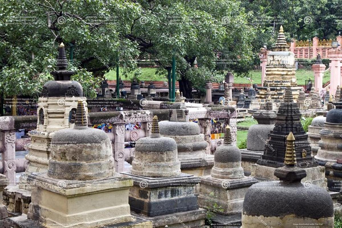 a bunch of stone structures in a cemetery