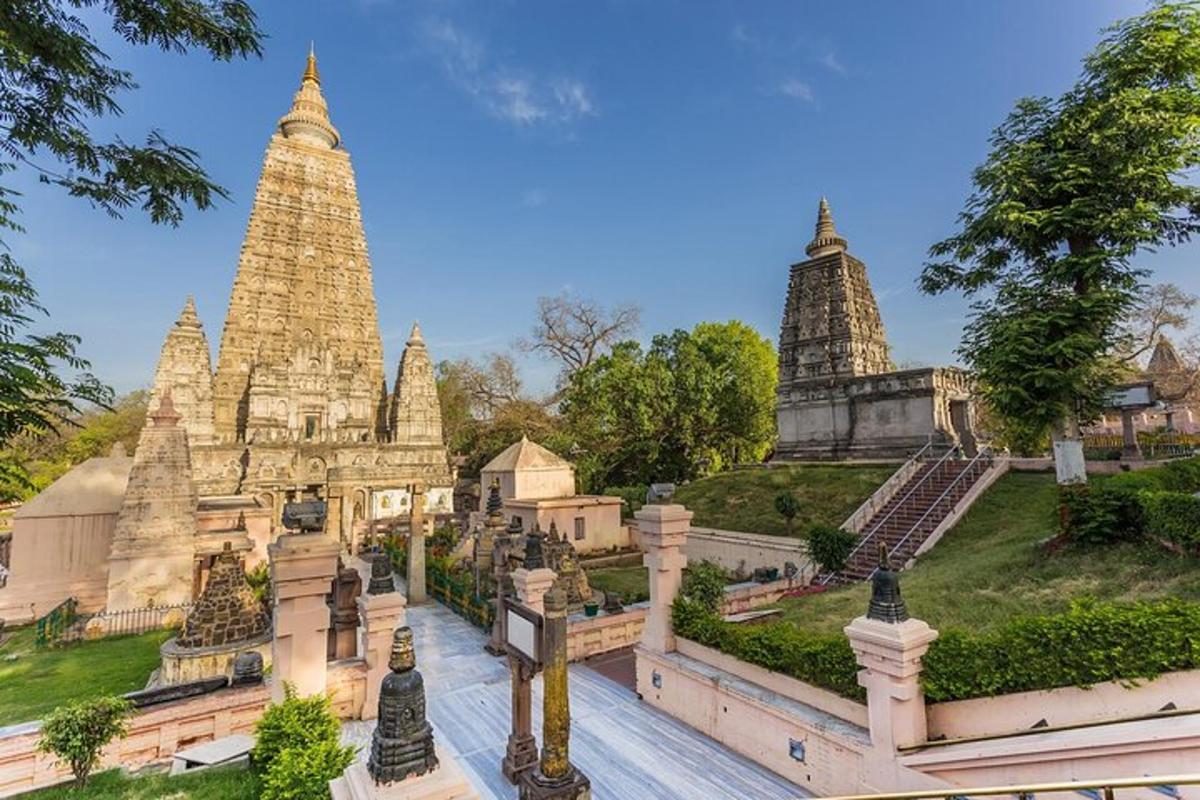 a view of a temple with towers in the background