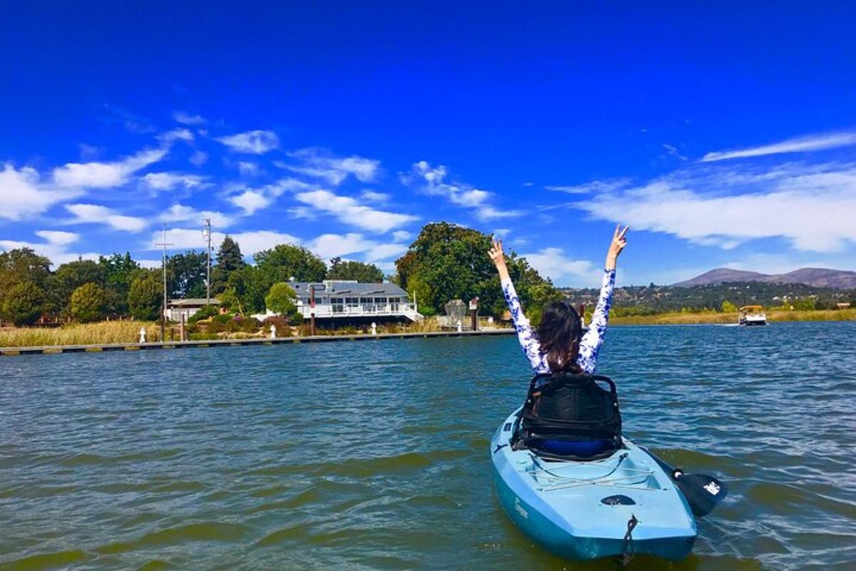 a person in a kayak on a body of water