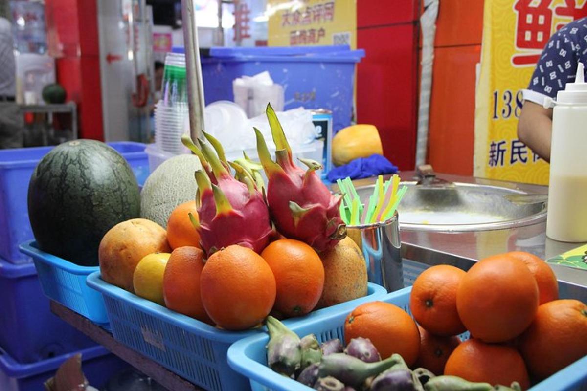 a display of fruits and vegetables in blue baskets