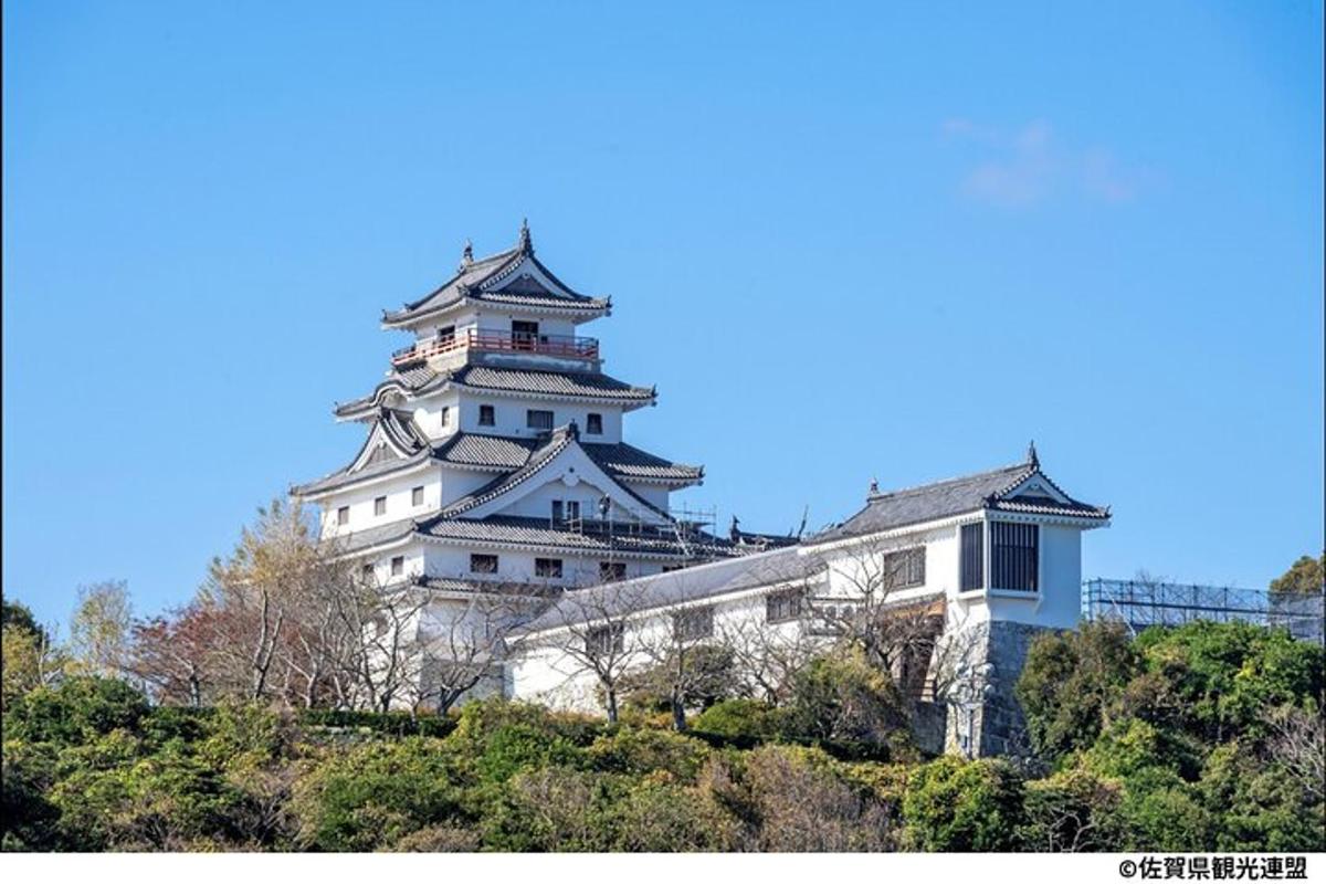 a large white building on top of a hill