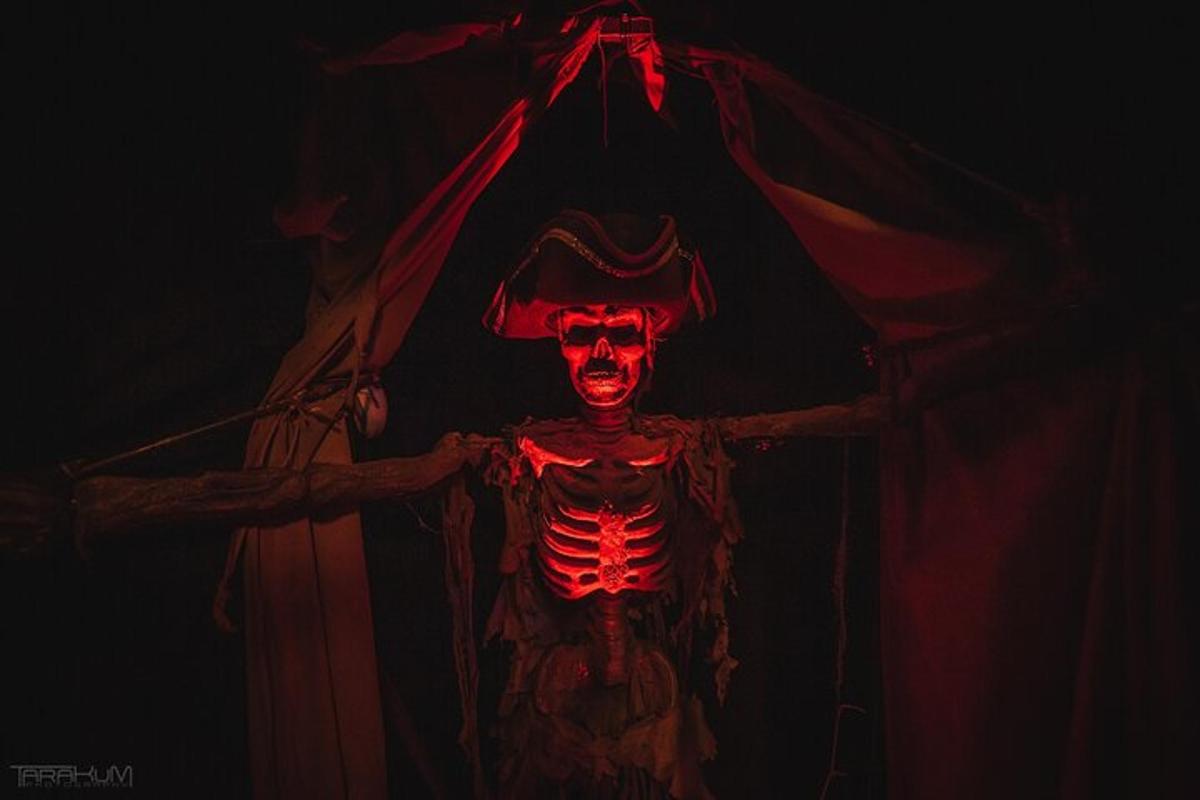 a skeleton with a red light on