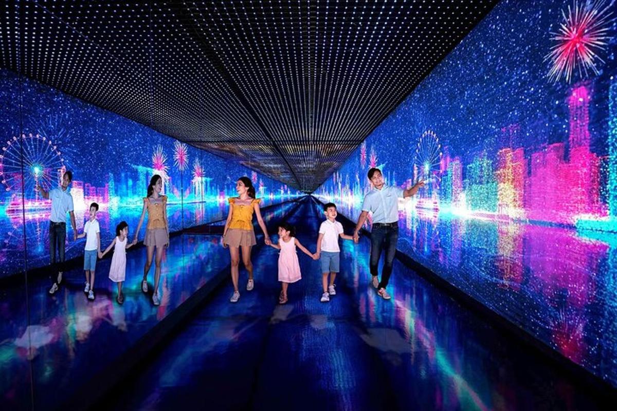 a family walking in a tunnel with fireworks
