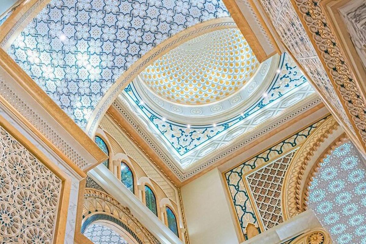 a building with a domed ceiling with blue and white tiles
