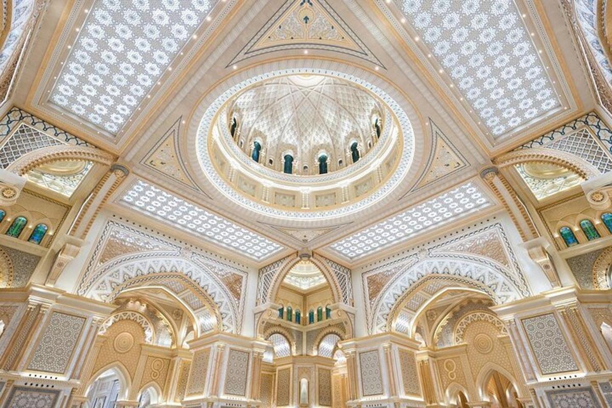 a building with a domed ceiling with people on it