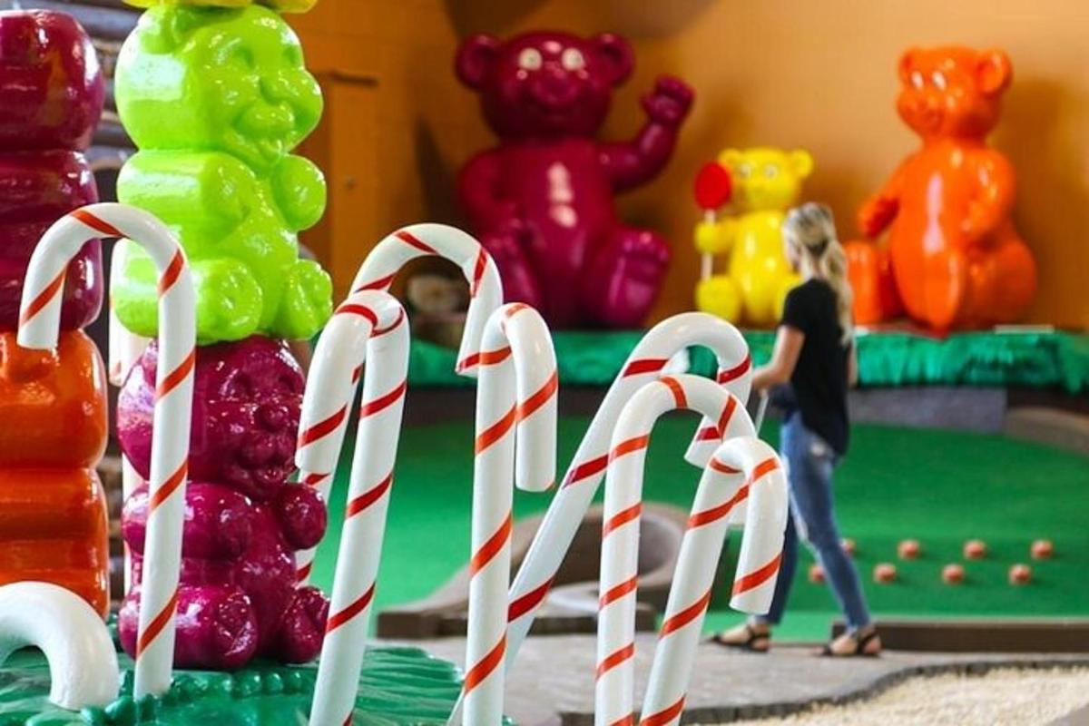a table with christmas candy canes in a play room