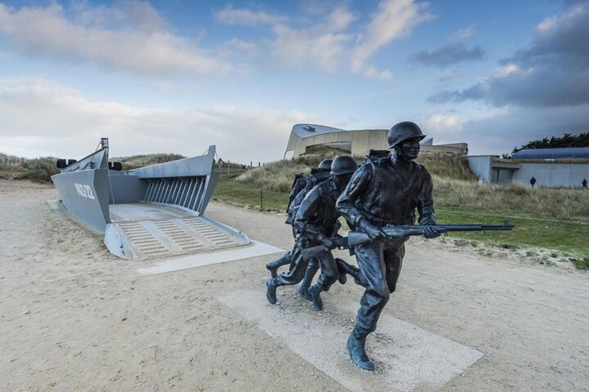 a statue of two men holding a gun