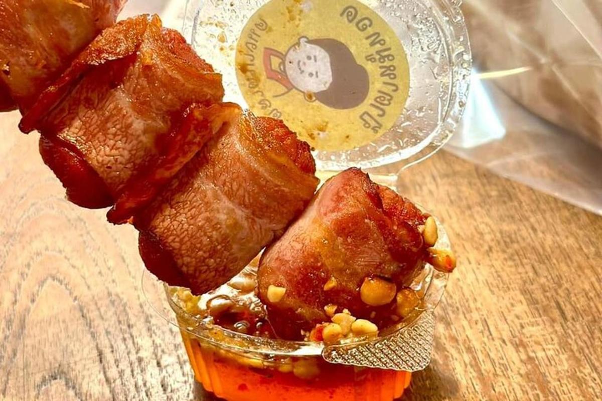 a cup with some food in it on a table