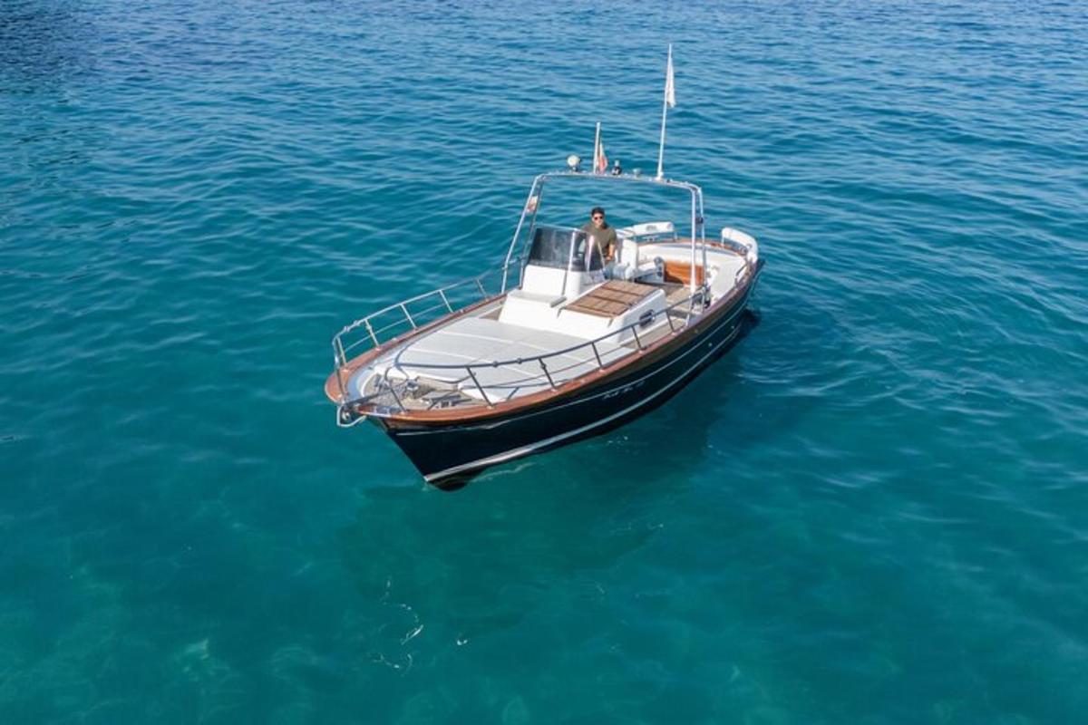 a small boat floating in the water