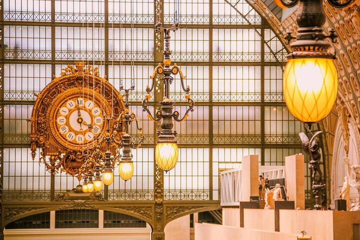 a large clock hanging from the ceiling of a building
