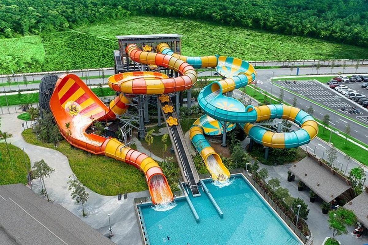 an aerial view of a water park with a water slide